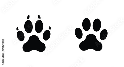 Two simple black paw prints shown against a stark white background