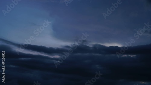 Time-lapse of sunset and sunrise, with clouds gathering before the rain, clouds after bad weather, heavy rain before a storm, and a loop of thunderstorms. Typhoon Sky, tornado cloud.
