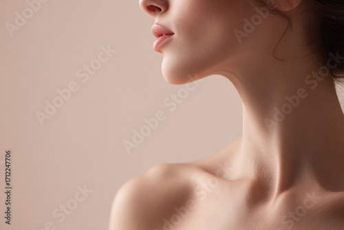 Smooth female neck, shoulder, and jawline in soft lighting, highlighting healthy skin texture and natural beauty, conveying calm and elegance in minimal studio setting