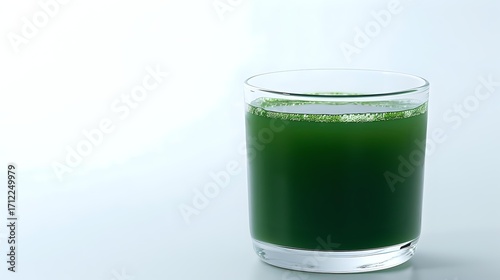 Wallpaper Mural Glass of fresh green smoothie or juice on white background, healthy detox drink made from vegetables or algae, natural organic beverage. Torontodigital.ca