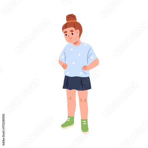 Girl standing with hands on hips. Happy smiling child in confident pose, look...