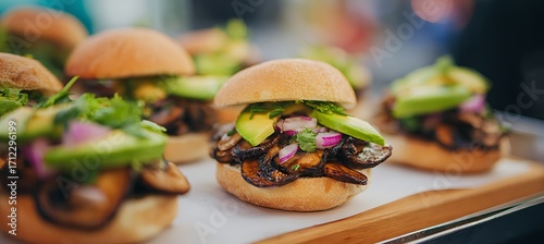 Delicious gourmet mushroom avocado sliders recipe for party appetizers and catering food photography idea