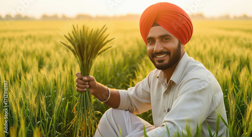 A farmer in a sunlit wheat field holds a handful of ripe, golden crop, dressed in traditional attire with a vibrant turban, symbolizing agricultural prosperity and rural success.