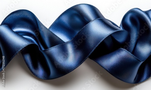 Luxurious deep blue satin ribbon in flowing curves
