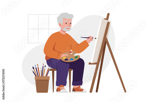 Elderly man painting on a canvas on an easel