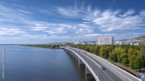 Wallpaper Mural Scenic Bridge Over Water: A panoramic view of a modern bridge gracefully spanning a vast expanse of water under a vibrant blue sky, embodying connectivity and architectural excellence.  Torontodigital.ca