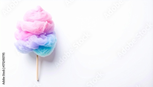 Soft fluffy cotton candy on a stick isolated on white background, highlighting spun sugar texture, perfect for carnival themes, playful designs, fairground sweets, and party visuals.