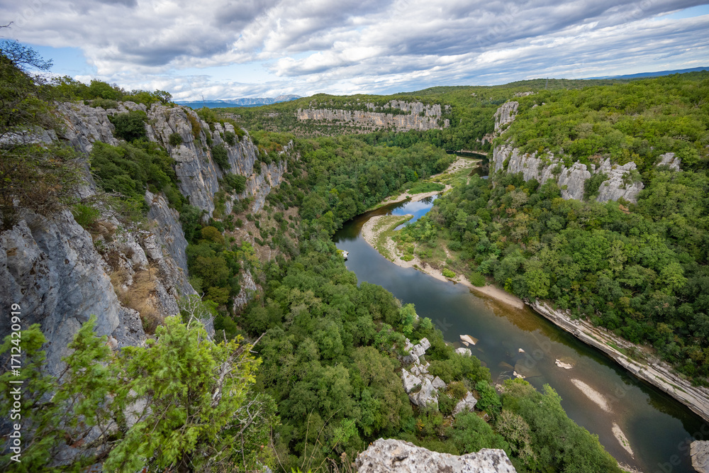 Fototapeta premium The Ardèche River Flowing Through the Dramatic Gorges de l'Ardèche