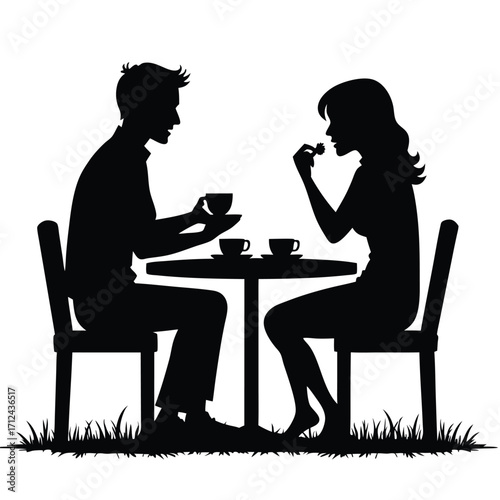 Couple silhouette drinking coffee at outdoor table with grass