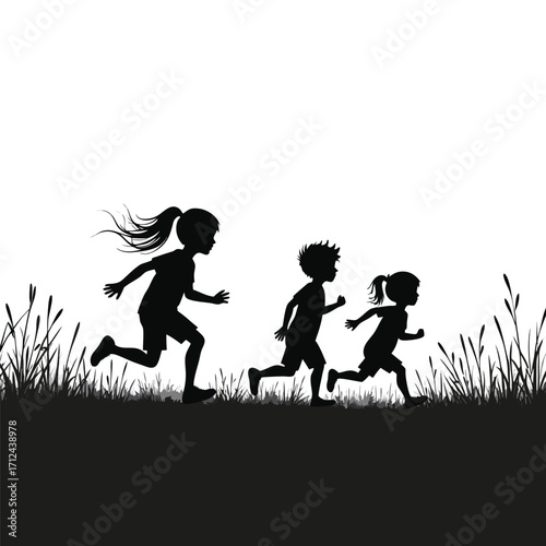 Three children running in silhouette through grass