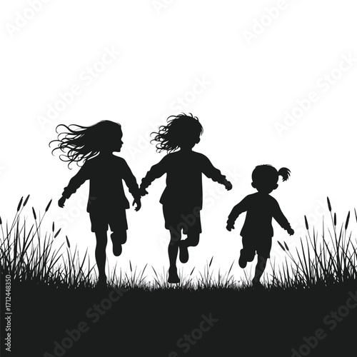 Three children running through tall grass silhouette