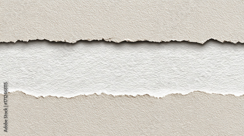 Abstract background of beige torn paper with ripped edge revealing white texture. blank copyspace for message with feeling of separation and simplicity