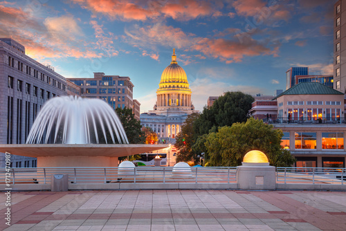 Madison, Wisconsin, USA. Cityscape image of downtown Madison with Wisconsin State Capitol Building at beautiful autumn sunset.