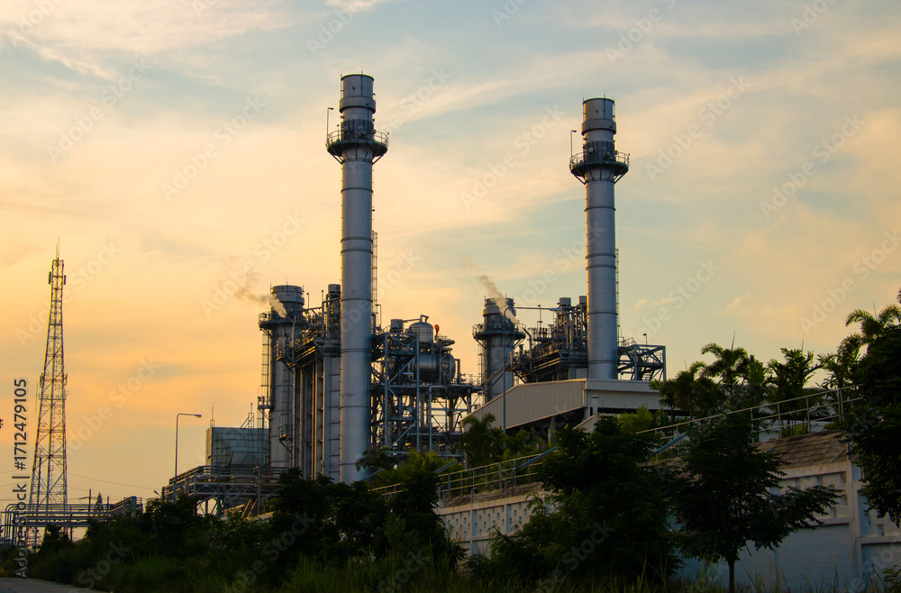 Obraz premium Natural Gas Combined Cycle Power Plant ,Gas turbine electrical power plant with in Twilight power for factory energy concept.