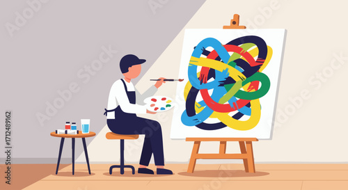 Artist painting abstract art on canvas in a studio showcasing creativity and artistic expression.