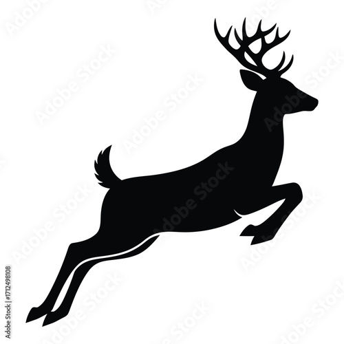 Majestic silhouette of a leaping stag deer with antlers in motion silhouette