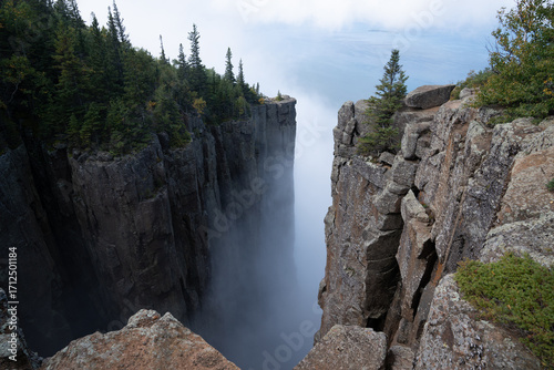 Top of the giant vertical drop with fog on the landscape. Sleeping Giant provincial park, Ontario 