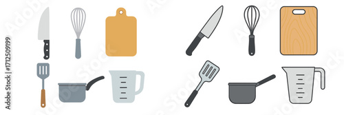 Collection of kitchen tools including knives, measuring cups, and spatulas arranged on a flat surface for culinary tasks
