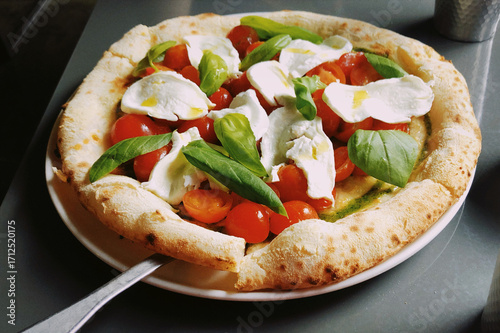 Fresh Italian Pizza with Mozzarella, Tomato, and Basil