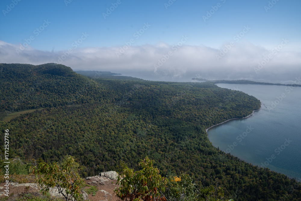 Fototapeta premium scenic view of Sleeping Giant Provincial Park forest in Ontario, Canada, captured in early autumn with trees beginning to change color.