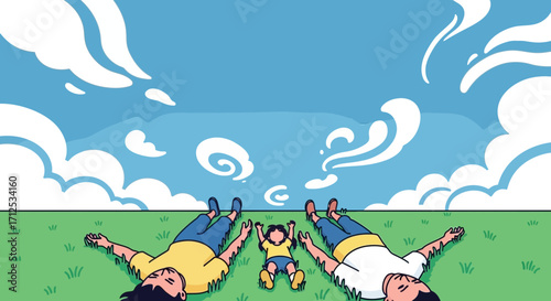 Family Lying on The Green Grass Looking Up At The Blue Cloudy Sky Together