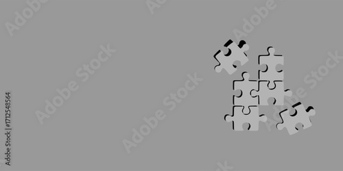 White puzzle pieces on grey background, top view. Space for text