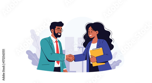 Two business people shake hands in a meeting. 