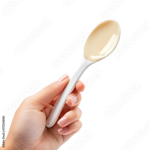 Close-Up of Hand Holding Spoon with Liquid Content - Professional Product Photography