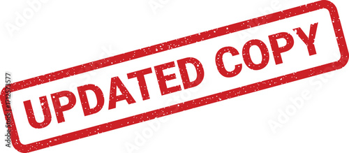 Distressed red updated copy rubber stamp, angled view for document overlay or mockup