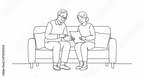 Senior couple looking at document while sitting on couch, enjoying quality time together in retirement. Mature man and woman analyze document with serious look, document is important for them.