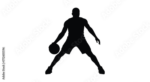 A basketball player dribbling with the ball in a dynamic pose silhouette