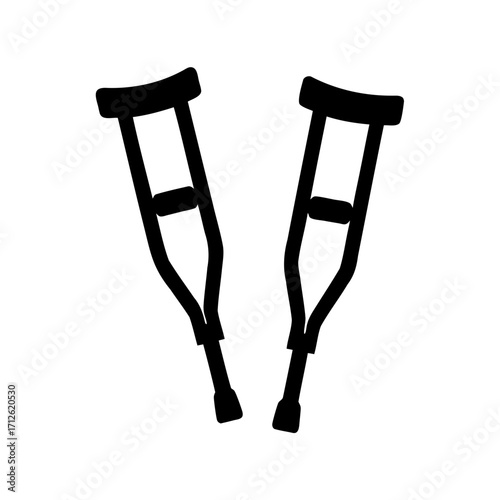 Two black crutches isolated on white surface with the handles up