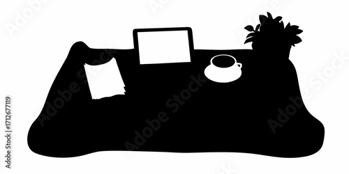 Elegant desk setup with laptop, coffee, and plant for productive workflow and home office lifestyle