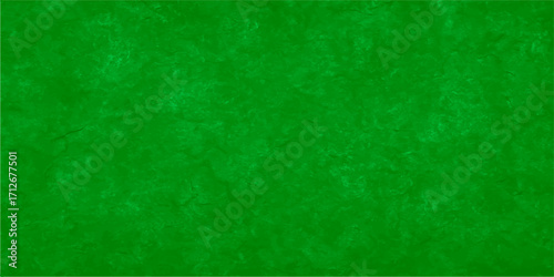 A green grunge texture with a vintage paper pattern. Bright and shinny abstract green background. grunge texture for wallpaper, cover and card. Fluffy and smoky green background, dark green grunge
