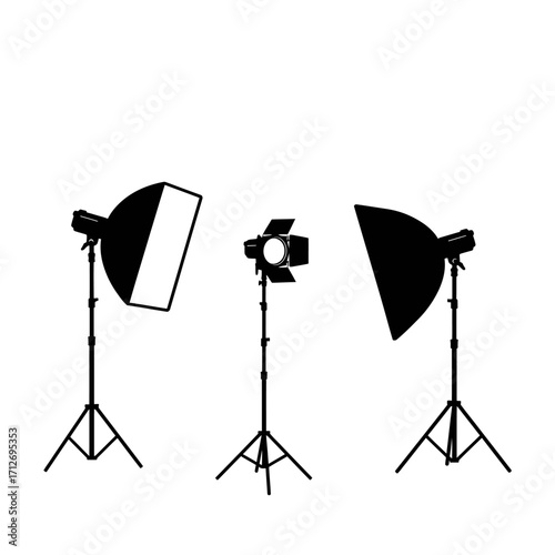 Professional photography studio lighting equipment set on tripods for creative shoots isolated on white background