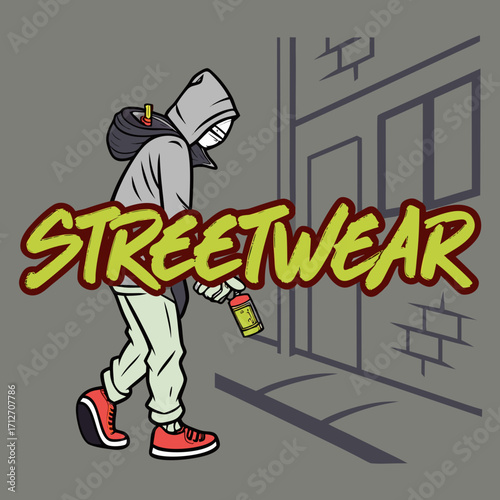 A hooded figure sprays the word streetwear on a brick wall in a back alley