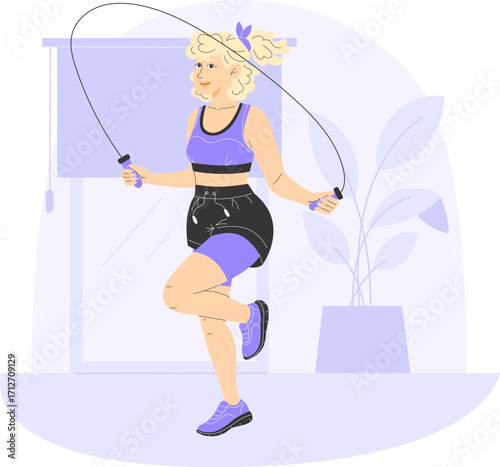 Young woman in sportswear jumping rope in gym during fitness workout for healthy lifestyle