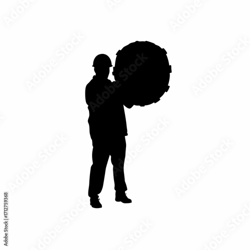 Silhouette of tunnel boring machine operator inspecting cutter head isolated on white background