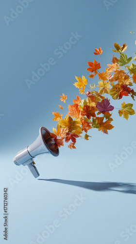 A megaphone with autumn leaves flying out of it. Background for autumn advertising. Concept: message, explanation in autumn style.	