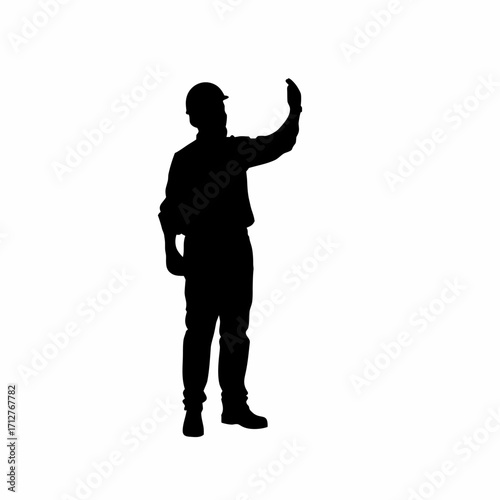 Silhouette of construction worker signaling crane operator for sheet placement isolated on white background
