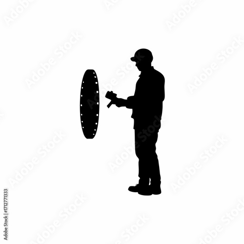 Operator measuring tunnel wall thickness beside tbm machine silhouette isolated on white background
