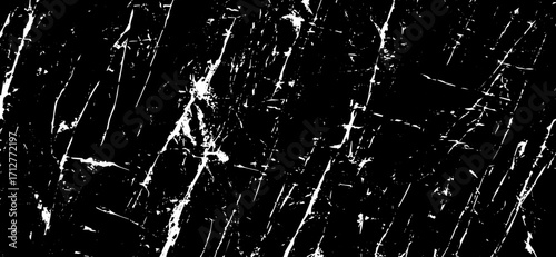 An abstract texture featuring white streaks on a deep black background creates a dynamic and minimalist pattern reminiscent of marble or cracked ice, bringing striking contrast
