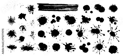 A collection of black ink spots and brushstrokes against a clean white backdrop evokes an artistic, abstract feel with various shapes and splatters creating dynamic visual texture