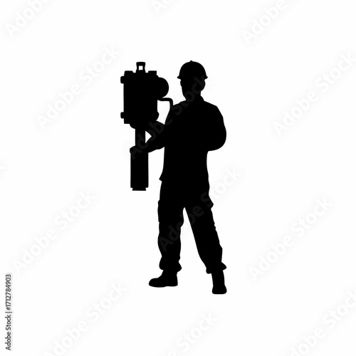 Silhouette of tbm worker checking lubrication system of cutter head on white background isolated on white background
