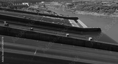 Black and white image of the ends of the Itaipu Hydroelectric Power Plant spillway along the Paraná River