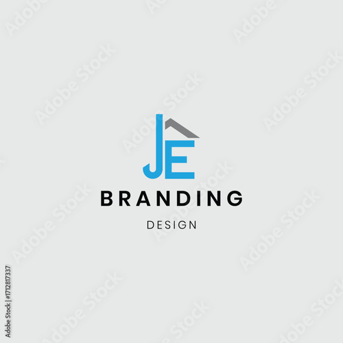 A logo combining a house and flat buildings with the initials “JE”, symbolizing real estate, property development, and modern living. Perfect for real estate agencies, housing projects, apartment comp