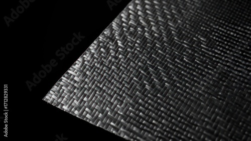 Textured plastic sheet against black background