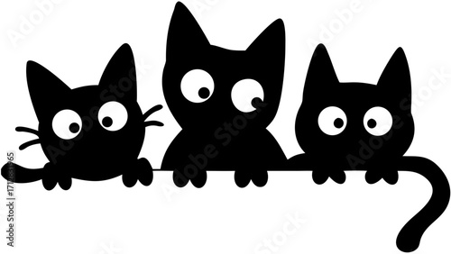 Three cute curious black kittens peek over a surface with wide, expressive eyes, bringing joy.