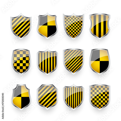 Glossy shields with yellow and black pattern. Security and protection concept. Cyber safety icons, internet privacy, web defense, digital data protection and antivirus themes. Vector illustration