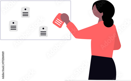 Woman in coral shirt placing paper on a whiteboard with other papers.